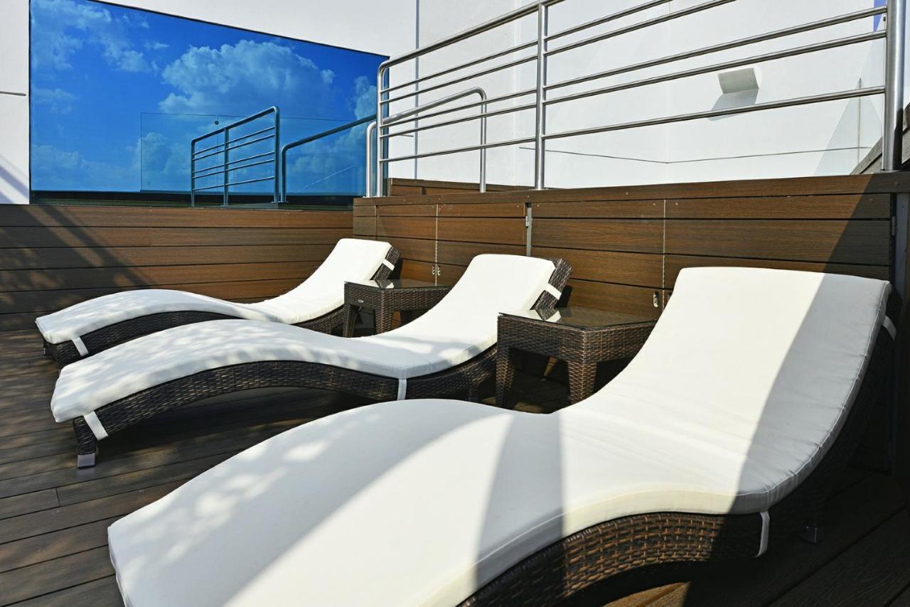 Baruk Guadalajara Hotel De Autor Exterior foto Sunbathing chairs on the deck of a cruise ship